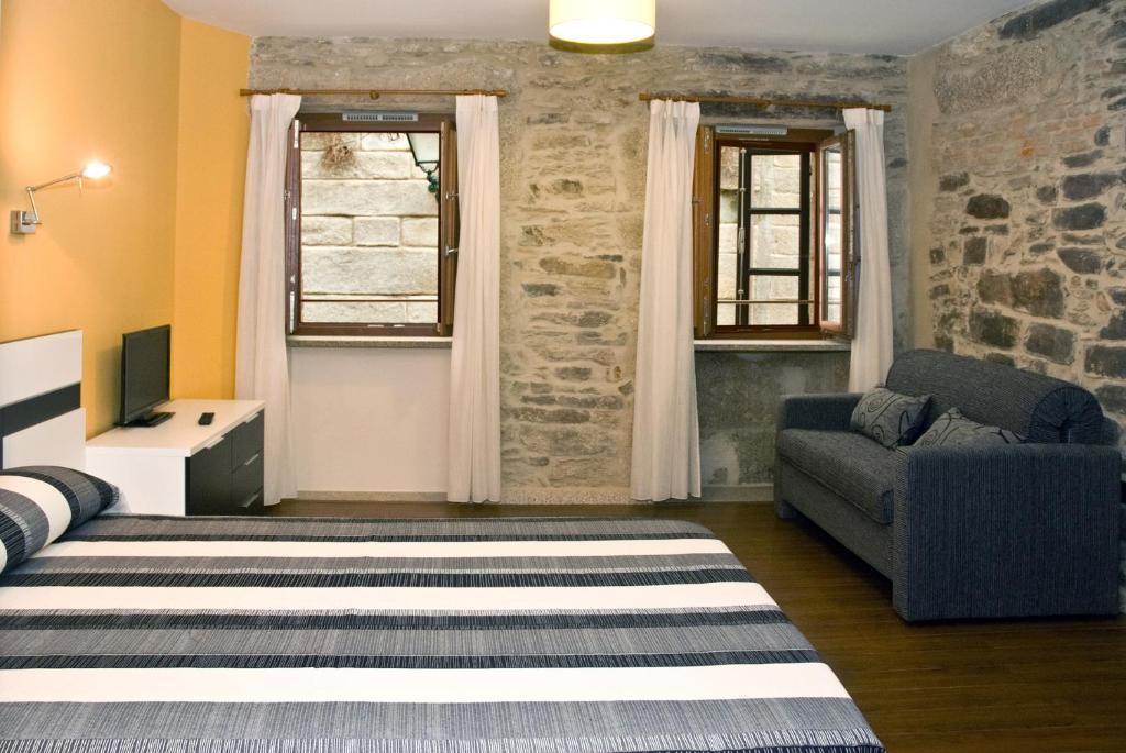 Apartamentos Domus Stellae سانتياغو دي كومبوستيلا الغرفة الصورة