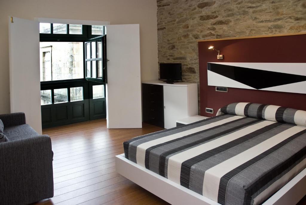 Apartamentos Domus Stellae سانتياغو دي كومبوستيلا الغرفة الصورة